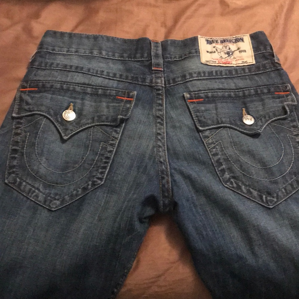 Two pairs of true religion jeans